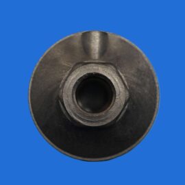 Close-up of a dark metal cylindrical component with a central bore and notch, against a blue background.