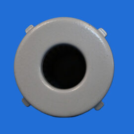 Close-up of a gray circular object with a dark central hole against a blue background for an informative image