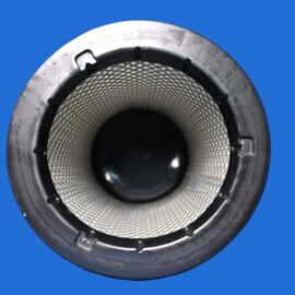 Close-up of a metal cylindrical object with a perforated mesh interior against a blue background, viewed from the rim.