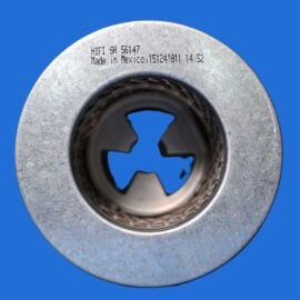 Close-up of a silver metal washer ring with stamped text on the edge, set against a blue background.