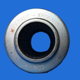 Close-up of a metallic circular bearing with an inner bore set against a bright blue background, showing engraved markings on the outer edge.