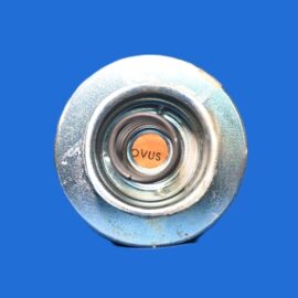 Close-up of a metallic spray nozzle with an orange label reading OVUS, set against a solid blue background.