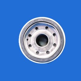 Six-lug metal wheel hub isolated on a solid blue background, viewed from the front