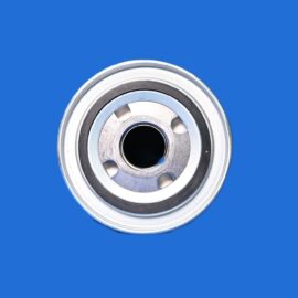Close-up of a shiny metal can lid with a central hole against a solid blue background.