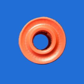 Close-up of an orange rubber gasket with a circular hole, set against a solid blue background.