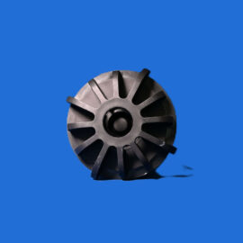 Part of a gray turbine impeller with spokes seen against a blue background.