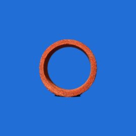 Orange circular ring partially visible against a solid blue background.
