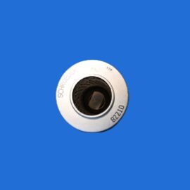 Top-down view of a metallic combination lock dial partially visible against a solid blue background
