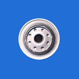 Close-up of a silver car wheel hub with holes, set against a solid blue background.