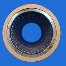 Close-up of a circular metal pipe flange with a perforated inner bore and a beige gasket against a solid blue background.
