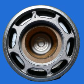 Close-up of a metal pulley wheel with spokes and an inner bearing, set against a blue background.