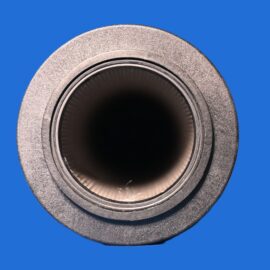 Close-up of a textured metal cylinder with a dark hollow center, viewed from above against a blue background, suggesting a pipe or fitting opening.